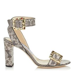 Jimmy Choo Dacha Snakeskin Sandals with jeweled buckles.